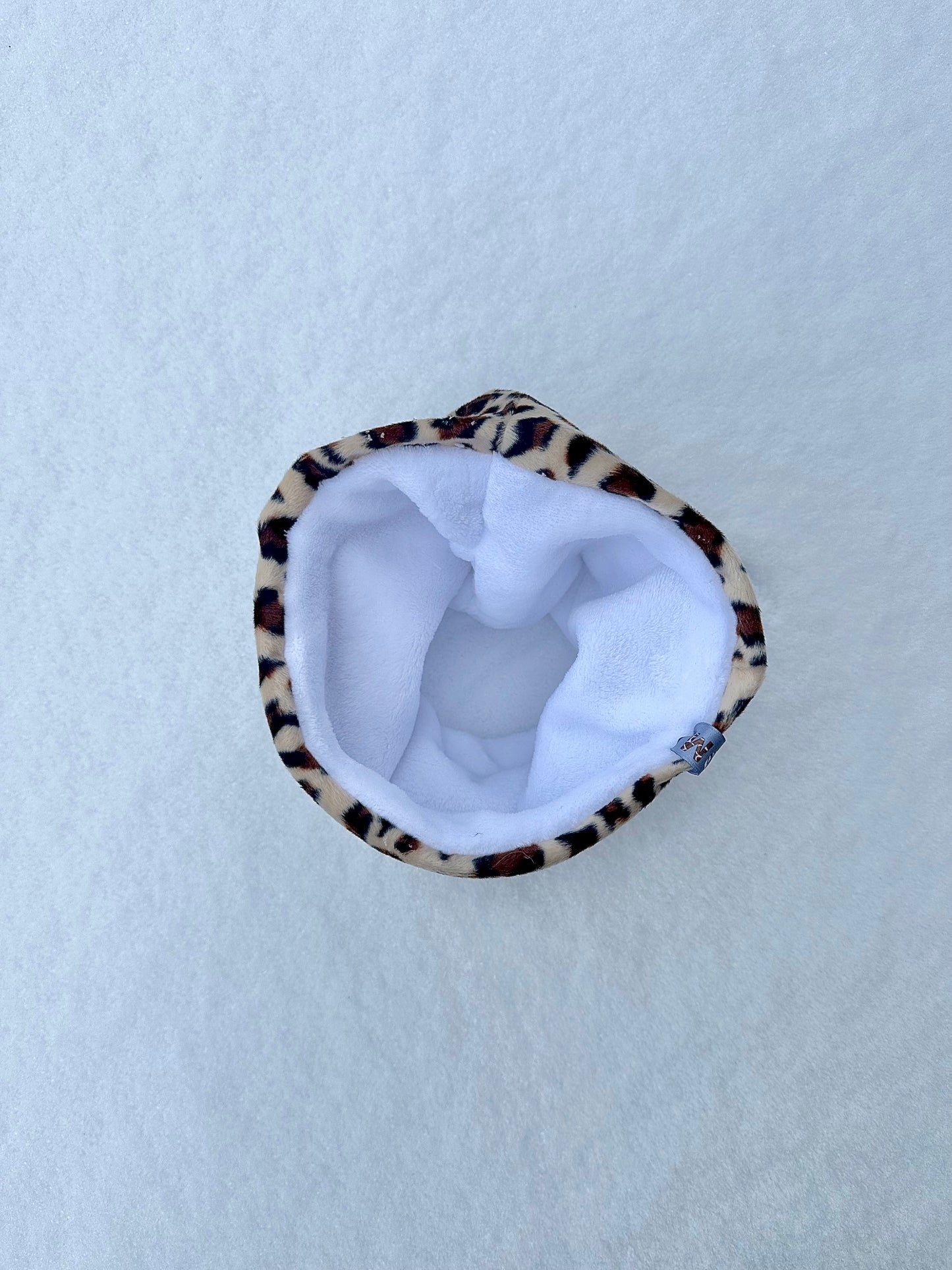 Cache-cou léopard blanc